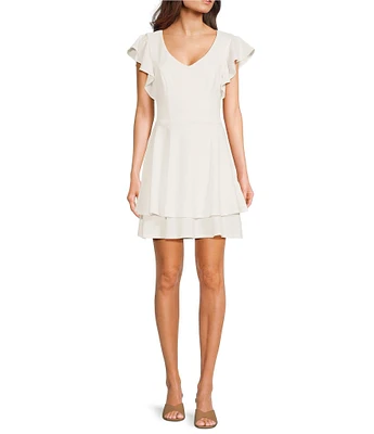 Next Up Short Flutter Sleeve V-Neck Back Twist Cut Out Loop And Button Solid Dress