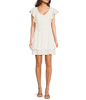 Next Up Short Flutter Sleeve V-Neck Back Twist Cut Out Loop And Button Solid Dress