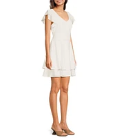 Next Up Short Flutter Sleeve V-Neck Back Twist Cut Out Loop And Button Solid Dress