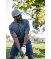 TravisMathew The Heater Performance Stretch Short Sleeve Polo Shirt