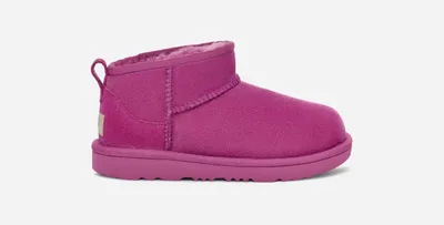 UGG® Kids' Classic Ultra Mini Sheepskin Classic Boots in Mangosteen