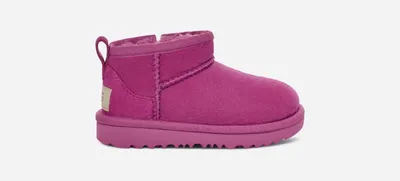 UGG® Toddlers' Classic Ultra Mini Sheepskin Classic Boots in Mangosteen