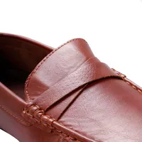 Mocasines color cognac para hombre con tiras cruzadas Dorothy Gaynor