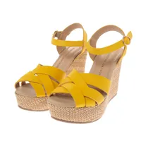 Sandalias Angelina color amarillo con cintas entrelazadas y cuña