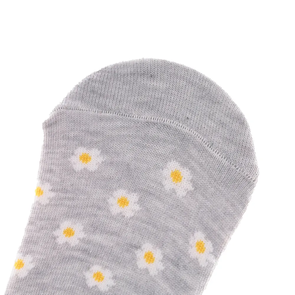 Footies color gris con puntos de colores