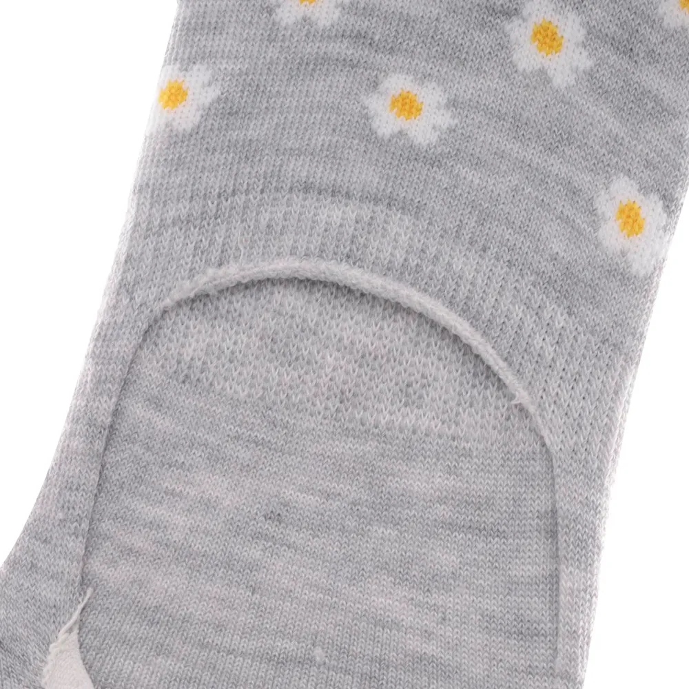 Footies color gris con puntos de colores