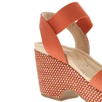 Sandalias Paulette color naranja con resorte y trenzado en suela