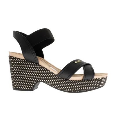 Sandalias Paulette color negro con resorte y trenzado en suela