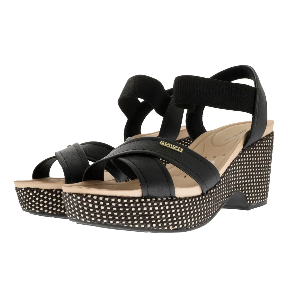 Sandalias Paulette color negro con resorte y trenzado en suela