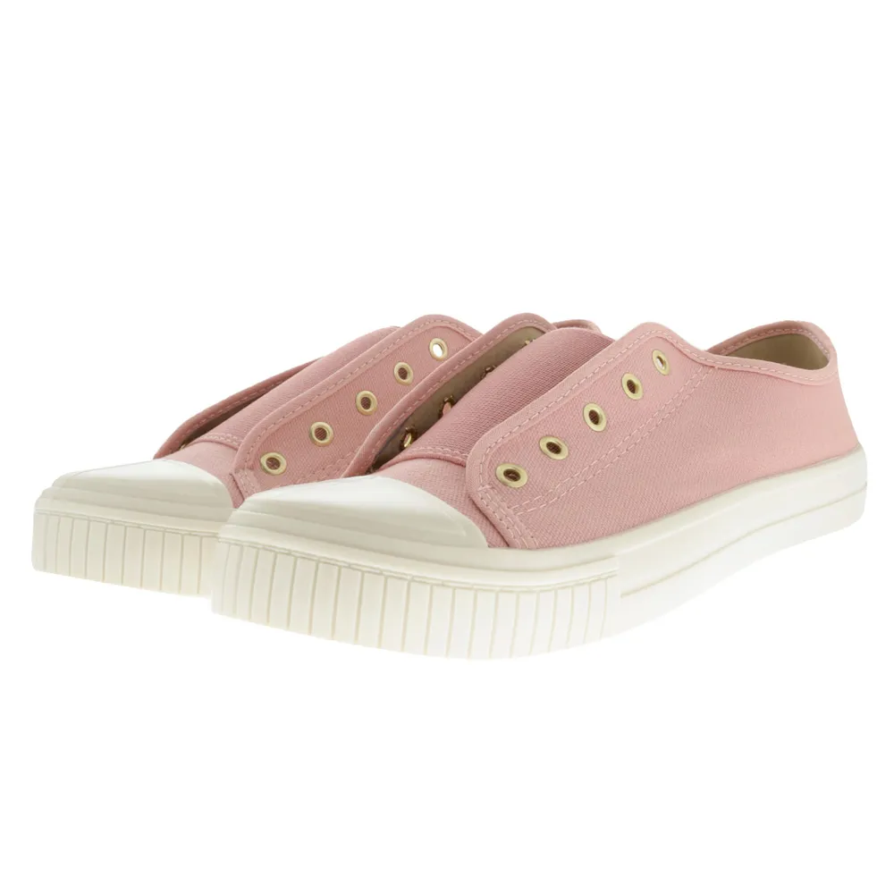 Tenis color rosa con punta y suela blanca