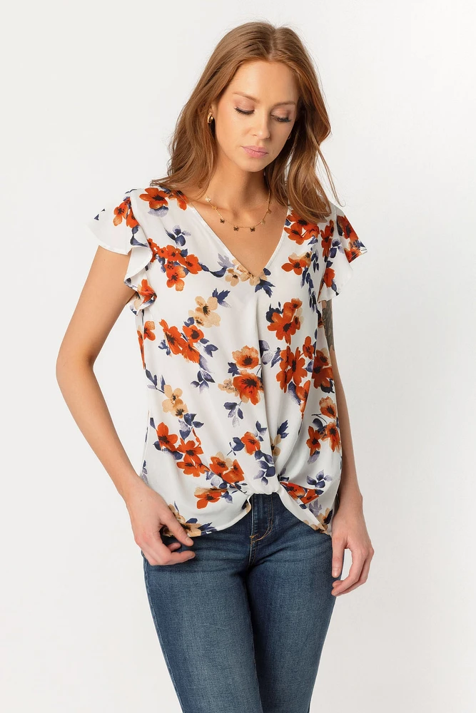 Blouse fleurie avec ourlet torsad