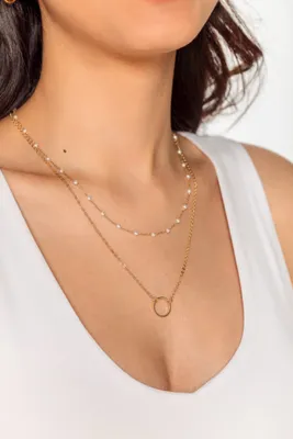 Double collier à perles et anneau