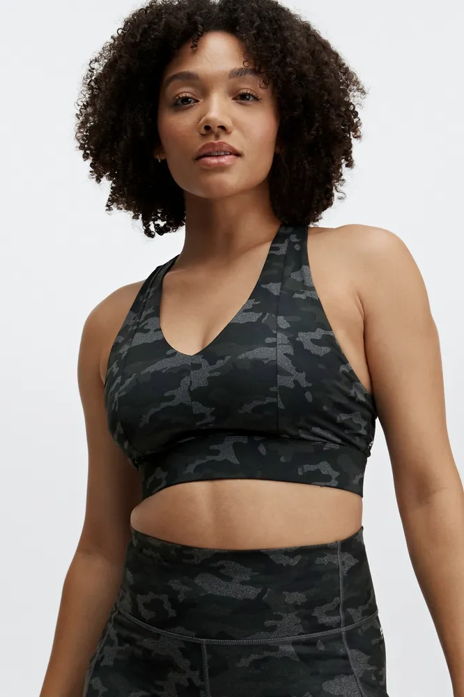 Fabletics On-The-Go Midi Medium Impact Sports Bra Womens Charcoal  Camo/Black Logo Size