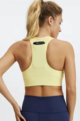 Fabletics On-the-Go Medium-Impact Sports Bra Womens yellow Size XXS