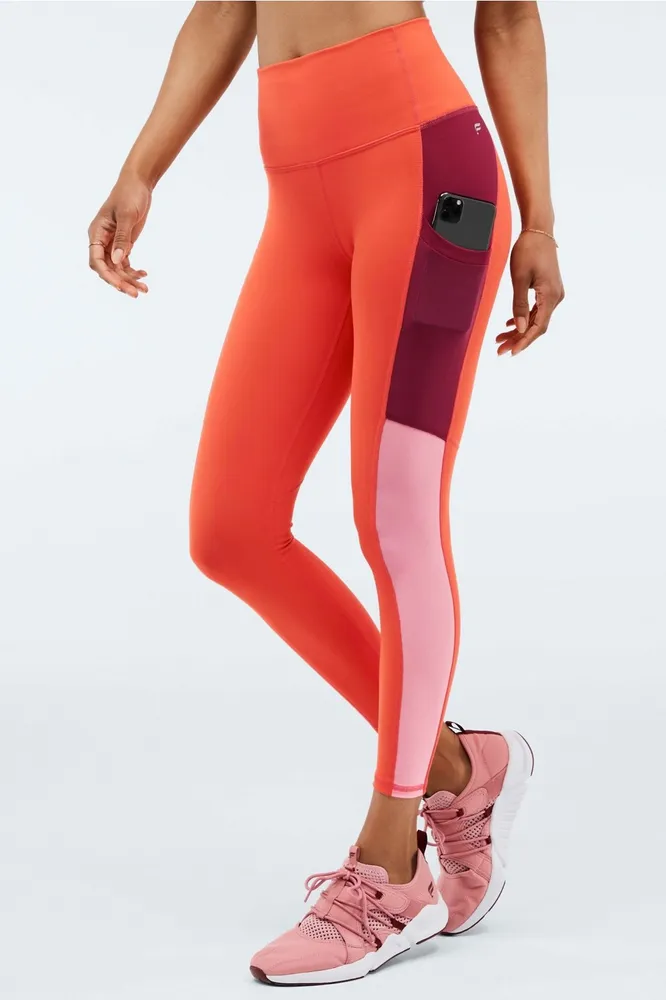 Fabletics On-the-Go Ultra High-Waisted 7/8 Legging Womens Bonfire/Sunset/Cherry Burst Size