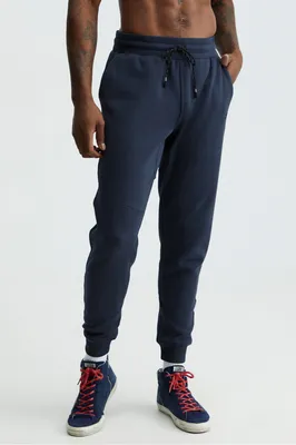 Fabletics Men The Postgame Jogger male Classic Navy Size