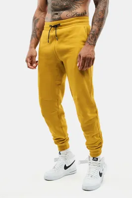 Fabletics Men The Postgame Jogger male Mustard Size M