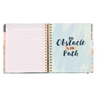 spiral-bound monthly planner