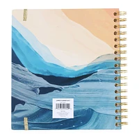 spiral-bound monthly planner