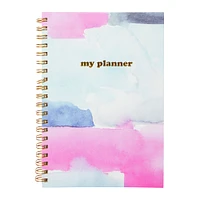 spiral-bound undated weekly planner