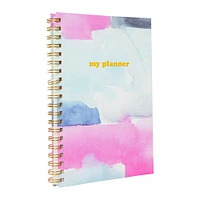 spiral-bound undated weekly planner