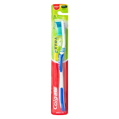 colgate® extra clean toothbrush, medium bristles