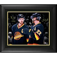 Daniel Sedin and Henrik Sedin Vancouver Canucks Framed Autographed 16" x 20" Throwback Jersey Spotlight Photograph