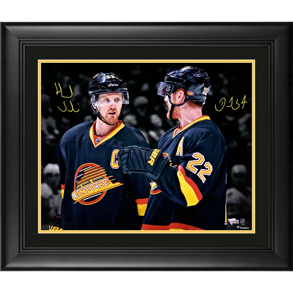 Daniel Sedin and Henrik Sedin Vancouver Canucks Framed Autographed 16" x 20" Throwback Jersey Spotlight Photograph
