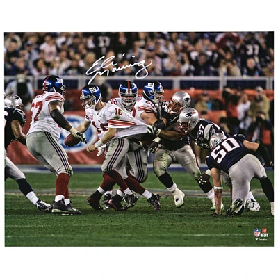 Eli Manning New York Giants Autographed 16" x 20" Super Bowl XLII Escaping Tackle Photograph