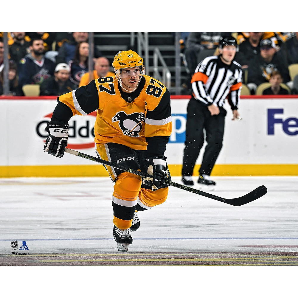 Sidney Crosby Pittsburgh Penguins Unsigned Gold Alternate Jersey Celebration Photograph