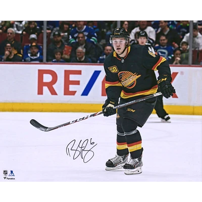 Brock Boeser Vancouver Canucks Autographed 16" x 20" Black Jersey Skating Photograph