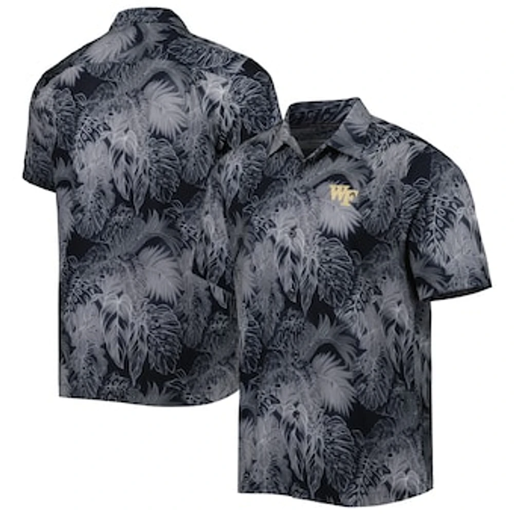 Men's Tommy Bahama Black Wake Forest Demon Deacons Coast Luminescent Frond IslandZone Button-Up Camp Shirt