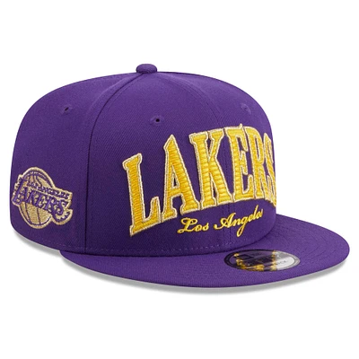 Men's New Era Purple Los Angeles Lakers Golden Tall Text 9FIFTY Snapback Hat