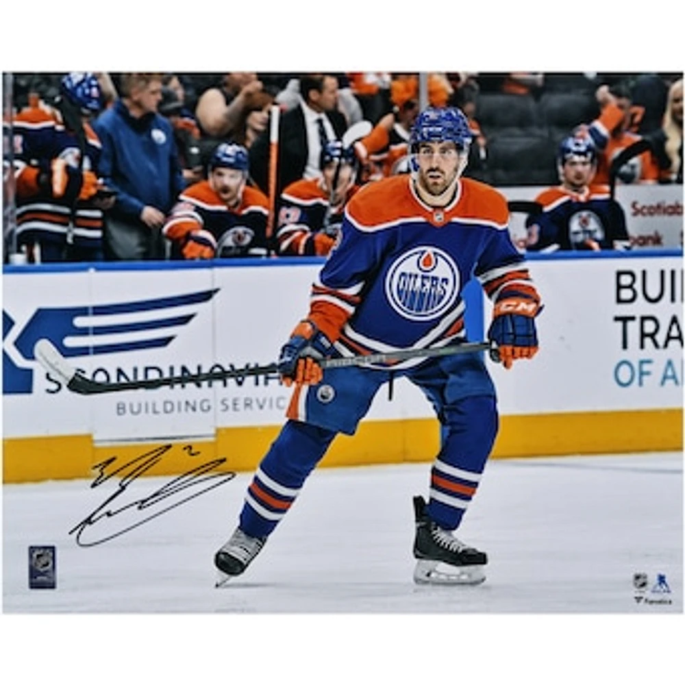 Evan Bouchard Edmonton Oilers Autographed 16" x 20" Royal Jersey Skating Photograph