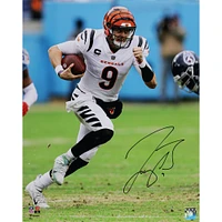 Joe Burrow Cincinnati Bengals Autographed 16" x 20" Running in White Jersey Photograph