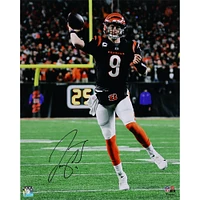 Joe Burrow Cincinnati Bengals Autographed 16" x 20" Throwing at Night in Black Jersey Photograph