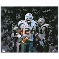 Limited Edition of 26: 2001 Miami Hurricanes Autographed Sean Taylor Spotlight Photograph with 20 Signatures including Ed Reed, Andre Johnson & Frank Gore