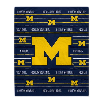 Michigan Wolverines 50'' x 60'' Logo Stripe Flannel Fleece Blanket