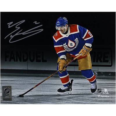 Evan Bouchard Edmonton Oilers Autographed 8" x 10" 2023 Heritage Classic with Puck Photograph