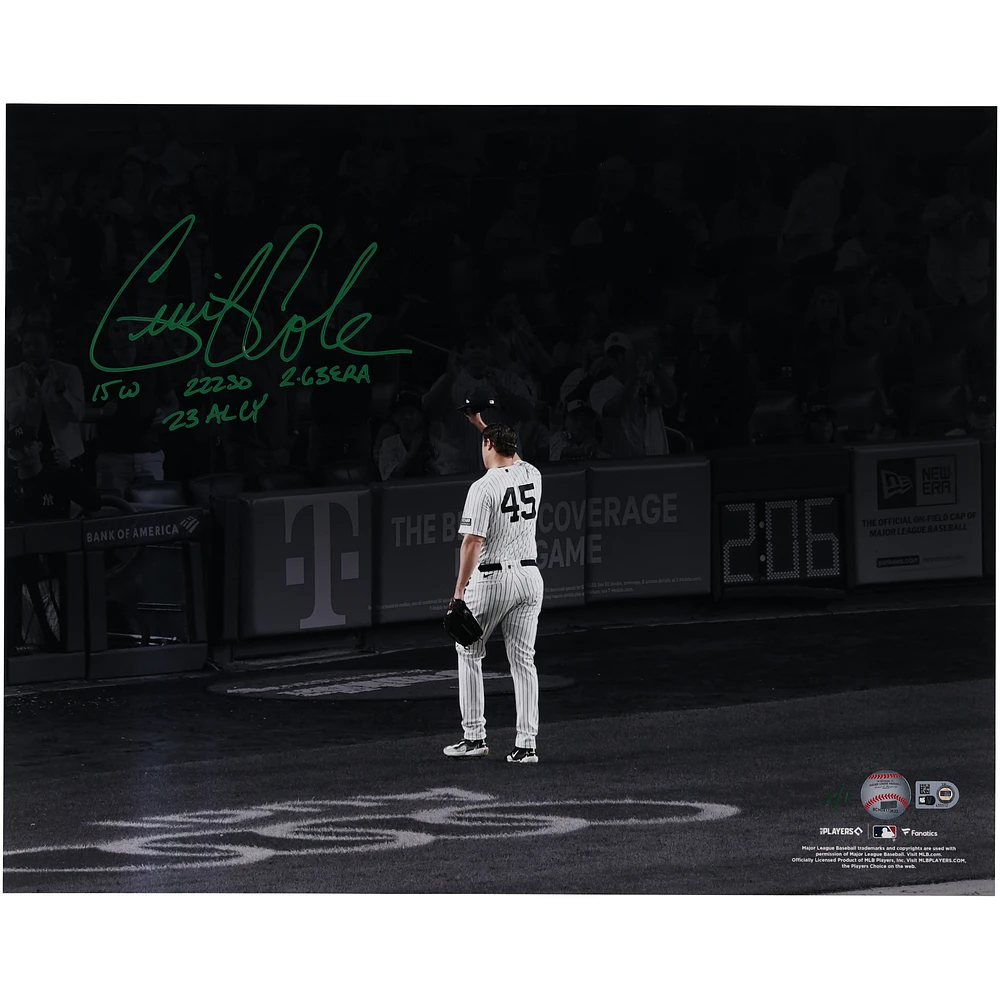 Gerrit Cole New York Yankees Autographed 16" x 20" Tip Cap Spotlight Photograph with 2023 AL Cy Young Stats Inscriptions - Limited Edition #1/1 - Signed in Green Ink