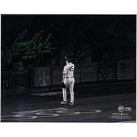 Gerrit Cole New York Yankees Autographed 16" x 20" Tip Cap Spotlight Photograph with 2023 AL Cy Young Stats Inscriptions - Limited Edition #1/1 - Signed in Green Ink
