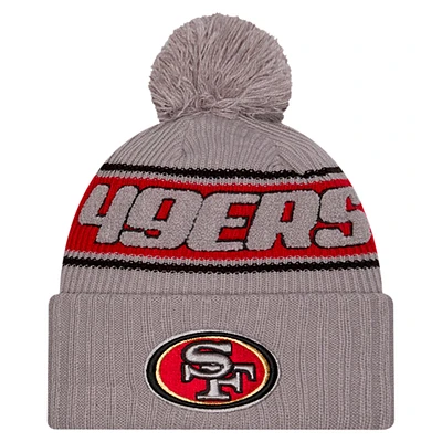 Men's New Era  Gray San Francisco 49ers 2024 Sideline Sport Cuffed Knit Hat with Pom