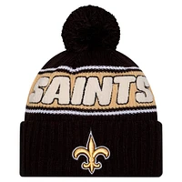 Youth New Era Black New Orleans Saints 2024 Sideline Sport Cuffed Knit Hat with Pom