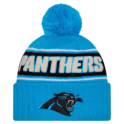 Youth New Era Blue Carolina Panthers 2024 Sideline Sport Cuffed Knit Hat with Pom