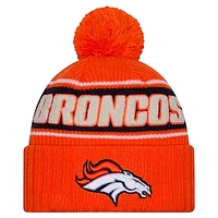 Youth New Era Orange Denver Broncos 2024 Sideline Sport Cuffed Knit Hat with Pom