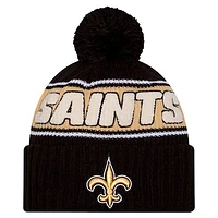 Men's New Era Black New Orleans Saints 2024 Sideline Sport Cuffed Knit Hat with Pom