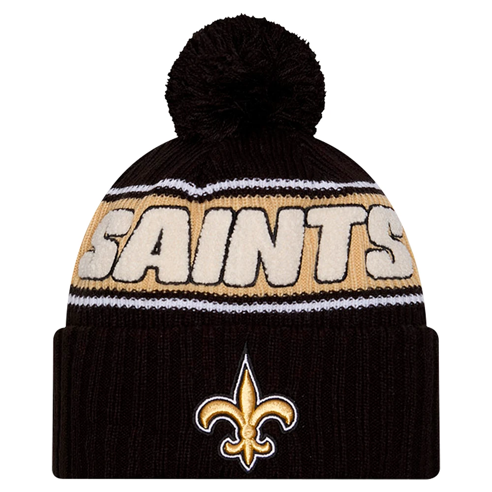 Men's New Era Black New Orleans Saints 2024 Sideline Sport Cuffed Knit Hat with Pom