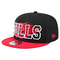 Men's New Era Black/Red Chicago Bulls Sport Night Splatter Two-Tone Snapback 9FIFTY Snapback Hat