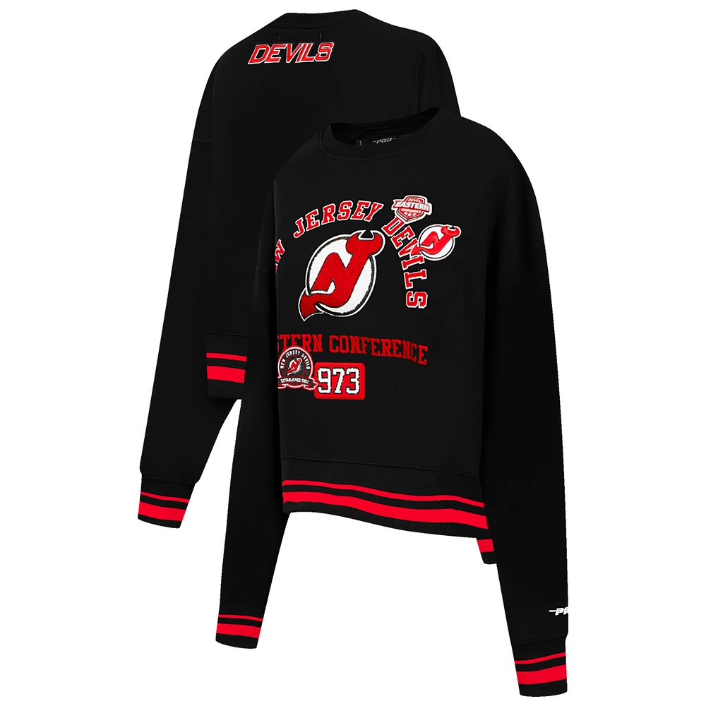 Women's Pro Standard  Black New Jersey Devils Area Code Cropped Pullover Sweatshirt