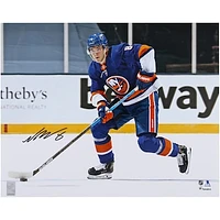 Noah Dobson New York Islanders Autographed 16" x 20" Blue Jersey Skating Photograph
